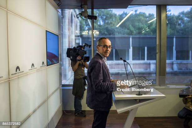 Joan Coscubiela, spokesman of Catalunya Si que es Pot, looks on during a news conference inside the Generalitat regional government offices in...