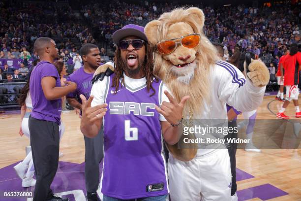 American rapper Lil Jon poses for a photo with Sacramento Kings mascot Slamson during the game between the Houston Rockets and Sacramento Kings on...