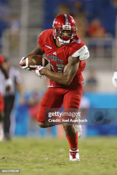 Kamrin Solomon of the Florida Atlantic Owls runs with the ball against the North Texas Mean Green on October 21, 2017 at FAU Stadium in Boca Raton,...