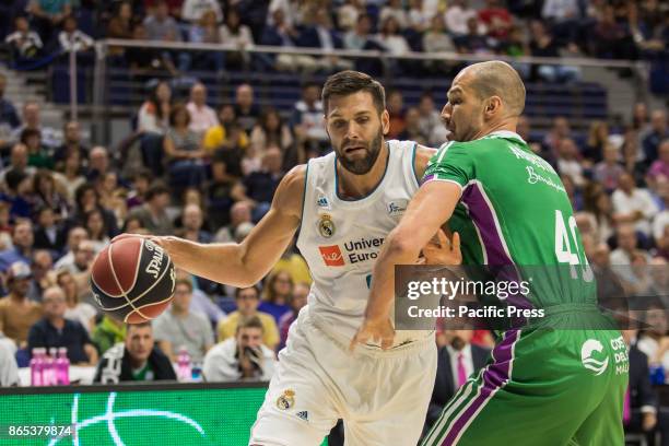 Felipe Reyes and James Augustine during Real Madrid victory over Unicaja Málaga in Liga Endesa regular season game celebrated in Madrid at Wizink...