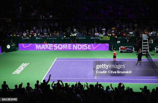 Simona Halep of Romania celebrates victory in her singles match against Caroline Garcia of France during day 2 of the BNP Paribas WTA Finals...