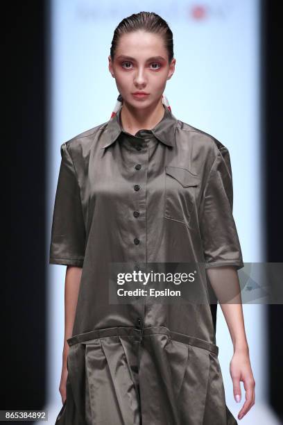 Model walks the runway at the Mikhail Manakov, Grand Prix of N.Lamanova Fashion Competition fashion show during day three of Mercedes Benz Fashion...