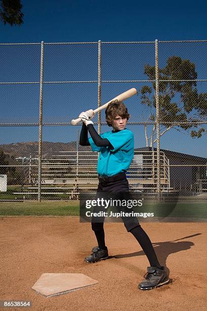 baseball player - kid hitting baseball stock pictures, royalty-free photos & images