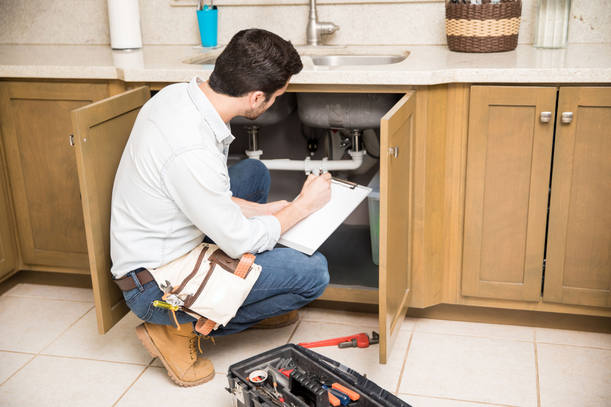 plumber inspecting