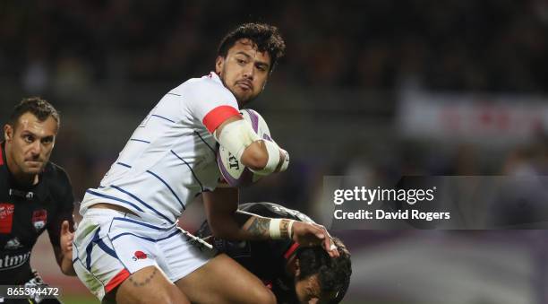 Denny Solomona of Sale is held during the European Rugby Challenge Cup match between Lyon and Sale Sharks at Matmut Stade de Gerland on October 20,...