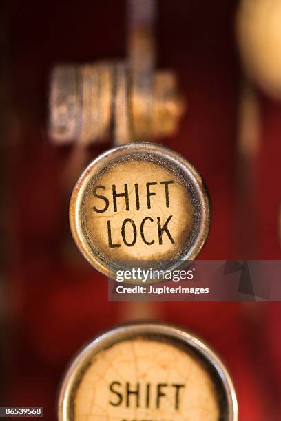 shift lock keys on typewriter - shift key stock pictures, royalty-free photos & images