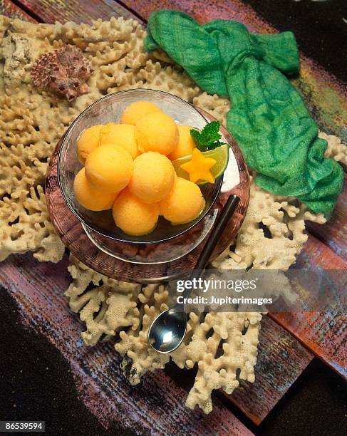mango ice cream on coral - orange sorbet stock pictures, royalty-free photos & images