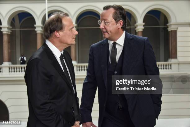 Edgar Selge and Matthias Brandt during the photo call to Michel Houellebecqs novel 'Unterwerfung' on October 23, 2017 in Berlin, Germany.