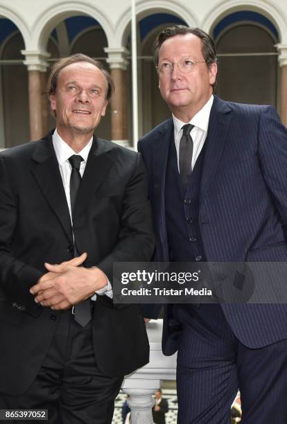 Edgar Selge and Matthias Brandt during the photo call to Michel Houellebecqs novel 'Unterwerfung' on October 23, 2017 in Berlin, Germany.
