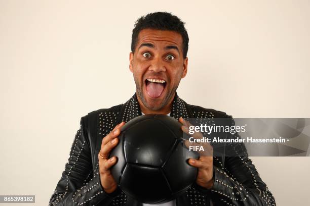 Dani Alves of Brazil poses during The Best FIFA Football Awards at The May Fair Hotel on October 23, 2017 in London, England.