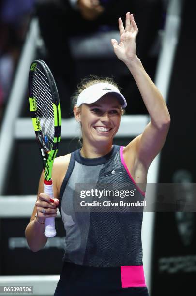 Caroline Wozniacki of Denmark celebrates victory in her singles match against Elina Svitolina of Ukraine during day 2 of the BNP Paribas WTA Finals...