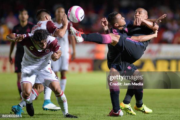 Martin Bravo of Veracruz and Carlos Salcido of Chivas fight for the ball during the 14th round match between Veracruz and Chivas as part of the...