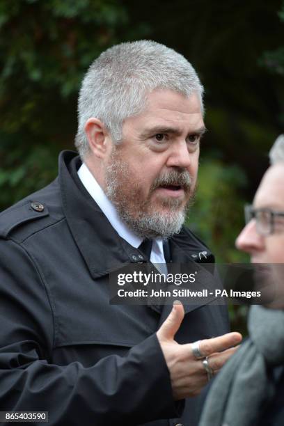 Phill Jupitus at the funeral of comedian Sean Hughes at Islington and Camden Cemetery in London.