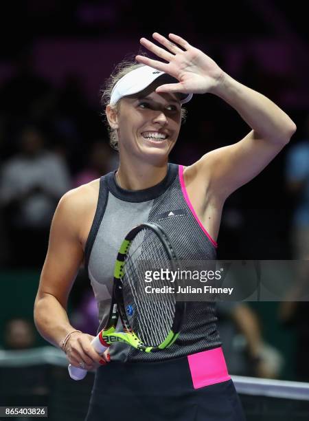 Caroline Wozniacki of Denmark celebrates victory in her singles match against Elina Svitolina of Ukraine during day 2 of the BNP Paribas WTA Finals...