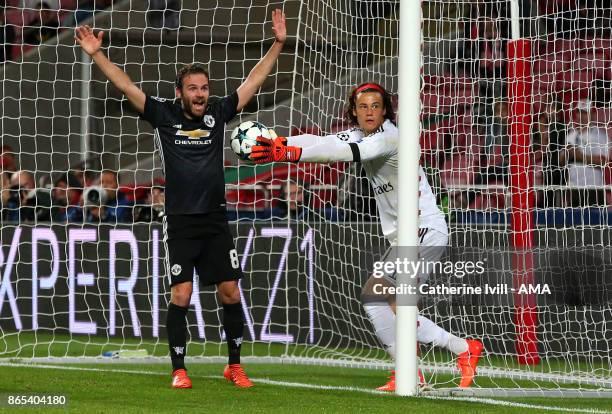 Juan Mata of Manchester United appeals after goalkeeper Mile Svilar of Benfica fails to stop the ball crossing the line during the UEFA Champions...