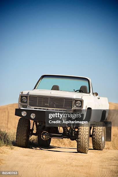 truck on dirt road - off highway vehicle stock pictures, royalty-free photos & images