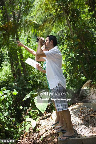 couple in tropical forest - eco tourism stock pictures, royalty-free photos & images