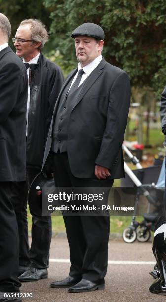 Johnny Vegas at the funeral of comedian Sean Hughes at Islington and Camden Cemetery in London.