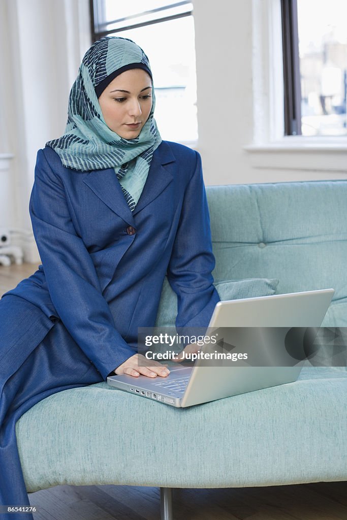 Iranian businesswoman with laptop computer