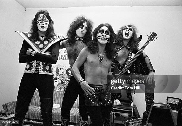 Guitarist Ace Frehley, singer-guitarist Paul Stanley, drummer Peter Criss and bassist Gene Simmons of Kiss pose in the dressing room before...