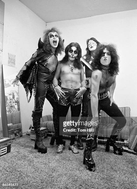 Bassist Gene Simmons, drummer Peter Criss, guitarist Ace Frehley and singer-guitarist Paul Stanley of Kiss pose in the dressing room before...