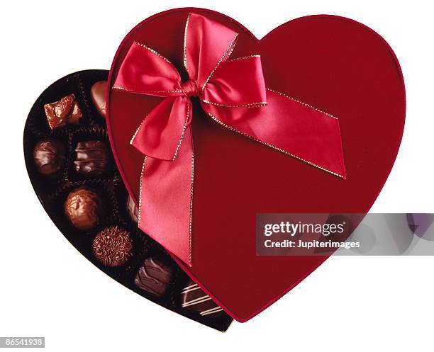box of chocolates - heart candy on white stock-fotos und bilder