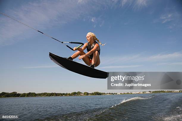 midair wakeboarder - wakeboarding stock pictures, royalty-free photos & images