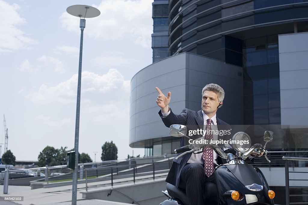 Businessman on motorcycle