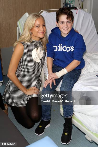 Pixie Lott shows her support for the Matalan #GetSpotted campaign by visiting the children of Alder Hey hospital at Alder Hey Children's Hospital on...