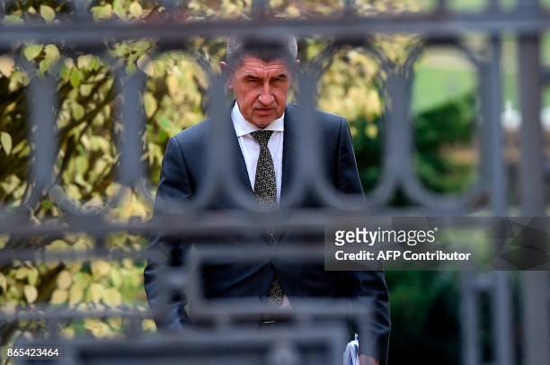 Leader of the ANO movement and billionaire Andrej Babis arrives to talk to journalists after a meeting with Czech Republic's president on October 23,...