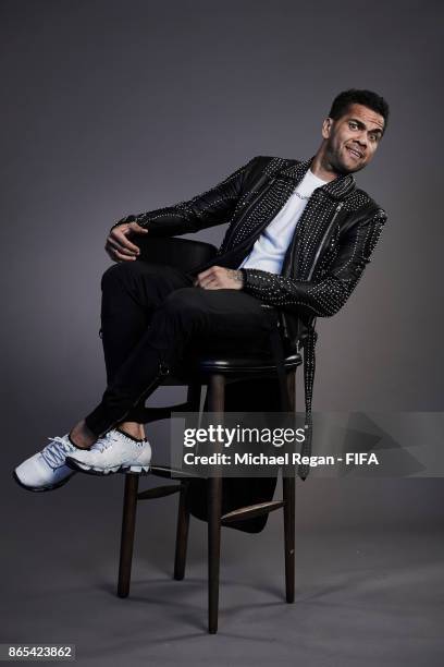 Dani Alves of Brazil poses during The Best FIFA Football Awards at The May Fair Hotel on October 23, 2017 in London, England.