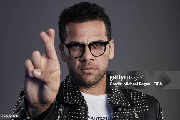Dani Alves of Brazil poses during The Best FIFA Football Awards at The May Fair Hotel on October 23, 2017 in London, England.