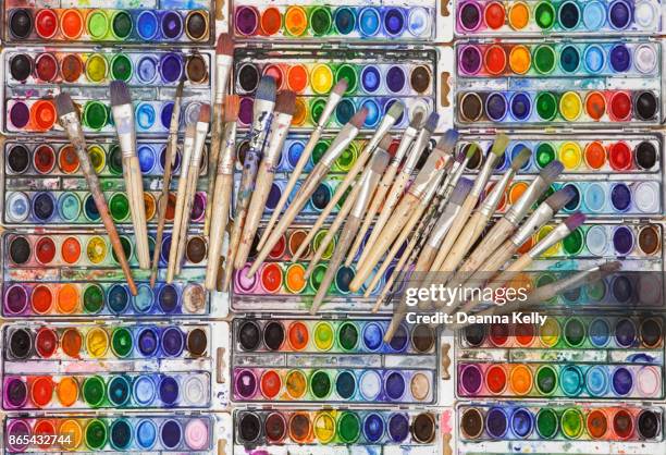 vividly colored watercolor pans with artist paintbrushes - chicago art museum stock pictures, royalty-free photos & images