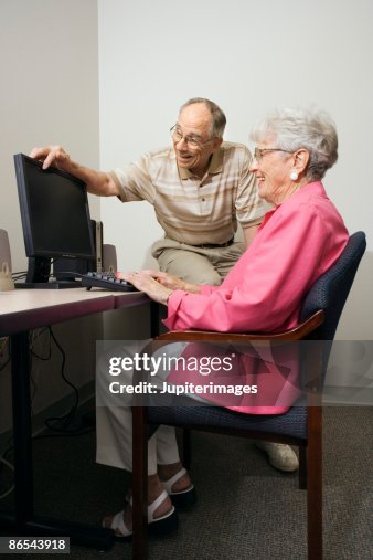Old Timers Using Computer Elderly People Using Computer High-Res Stock Photo - Getty Images