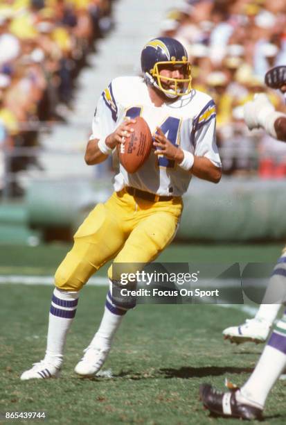 Dan Fouts of the San Diego Chargers drops back to pass against the Seattle Seahawks during an NFL football game October 14, 1979 at Jack Murphy...