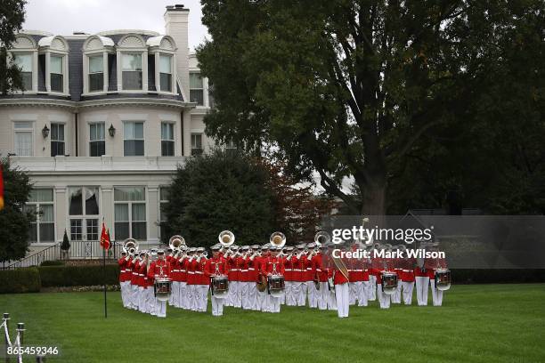 The US Marine Drum and Bugle Corp. Plays during a ceremony to commemorate the anniversary of the 1983 bombing of the Marine barracks in Beirut,...