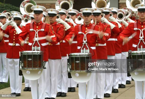 The US Marine Drum and Bugle Corp. Plays during a ceremony to commemorate the anniversary of the 1983 bombing of the Marine barracks in Beirut,...