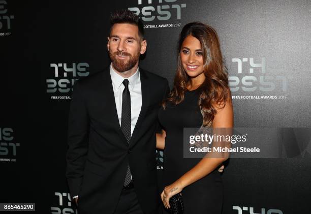 Lionel Messi and wife Antonella Roccuzzo arrive for The Best FIFA Football Awards - Green Carpet Arrivals on October 23, 2017 in London, England.