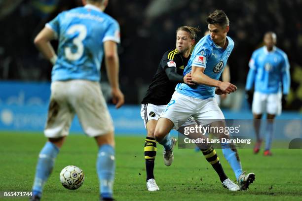 Daniel Sundgren of AIK and Markus Rosenberg of Malmo FF during the allsvenskan match between Malmo FF and AIK at Swedbank Stadion on October 23, 2017...