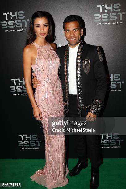 Dani Alves and wife Joana Sanz arrives for The Best FIFA Football Awards - Green Carpet Arrivals on October 23, 2017 in London, England.