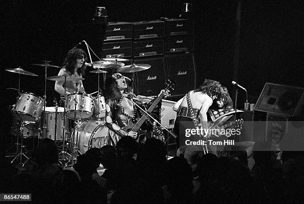 Drummer Peter Criss, bassist Gene Simmons, singer-guitarist Paul Stanley and guitarist Ace Frehley of Kiss perform at Alex Cooley's Electric Ballroom...