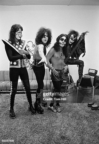 Guitarist Ace Frehley, singer-guitarist Paul Stanley, drummer Peter Criss and bassist Gene Simmons of Kiss pose in the dressing room before...