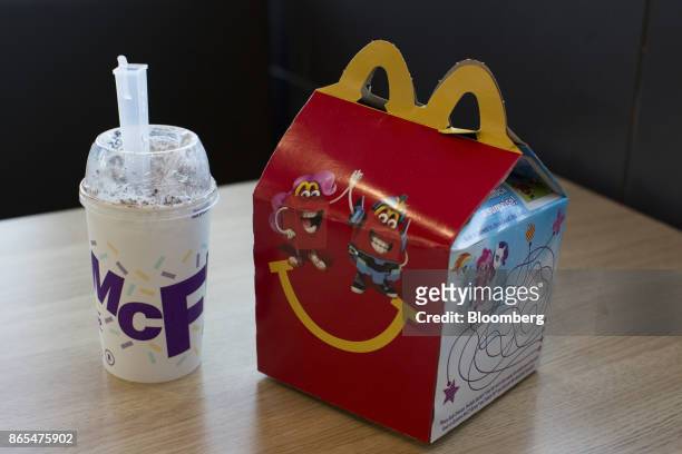 Happy Meal and McFlurry are arranged for a photograph at a McDonald's Corp. Fast food restaurant in Phoenix, Arizona, U.S., on Saturday, Oct. 21,...