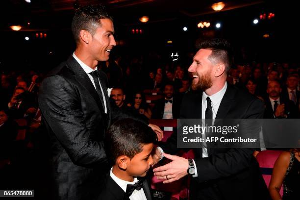 Nominees for the Best FIFA football player, Barcelona and Argentina forward Lionel Messi and Real Madrid and Portugal forward Cristiano Ronaldo chat...