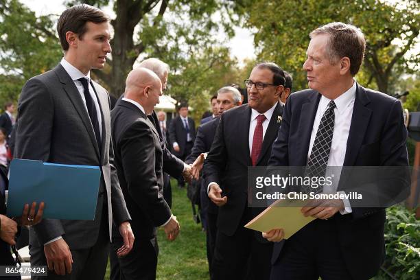 Trade Representative Robert Lighthizer talks with President Donald Trump's son-in-law and senior advisor Jared Kushner after Trump and Singapore...