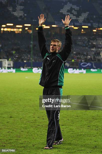 Per Mertesacker of Bremen celebrates victory after the UEFA Cup Semi Final second leg match between Hamburger SV and SV Werder Bremen at the HSH...