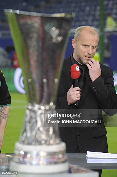 Werder Bremen's head coach Thomas Schaaf stands next to the UEFA Cup trophy as he speaks on camera after the Hamburger SV vs Werder Bremen UEFA Cup...