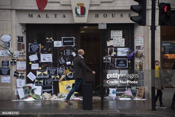 Messages, cartels and flowers have been left outside the Malta High Commission, for Daphne Caruana Galizia, at Malta House, London on October 23,...