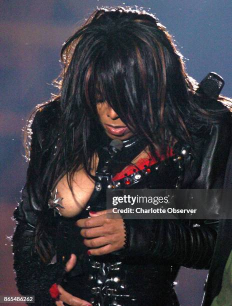 Janet Jackson grabs her chest after it was exposed during her halftime performance at Super Bowl XXXVIII at Reliant Stadium, Sunday, February 1, 2004...