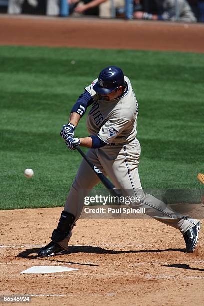 Adrian Gonzalez of the San Diego Padres takes a swing at an incoming pitch during the game against the Los Angeles Dodgers at Dodger Stadium on...